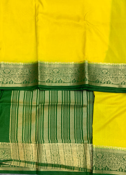 Crepe Saree Lemon Yellow Colour with Green Border