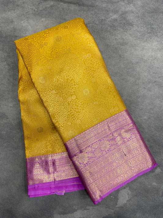 Fancy Tissue Saree Yellow Colour with Lavender Colour Border