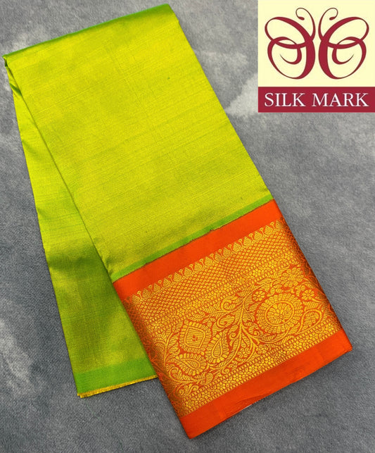 Lime Green Shade Pure Kanchipuram Kids Pattu Pavadai with Contrast Border for Newborn to 2 Years
