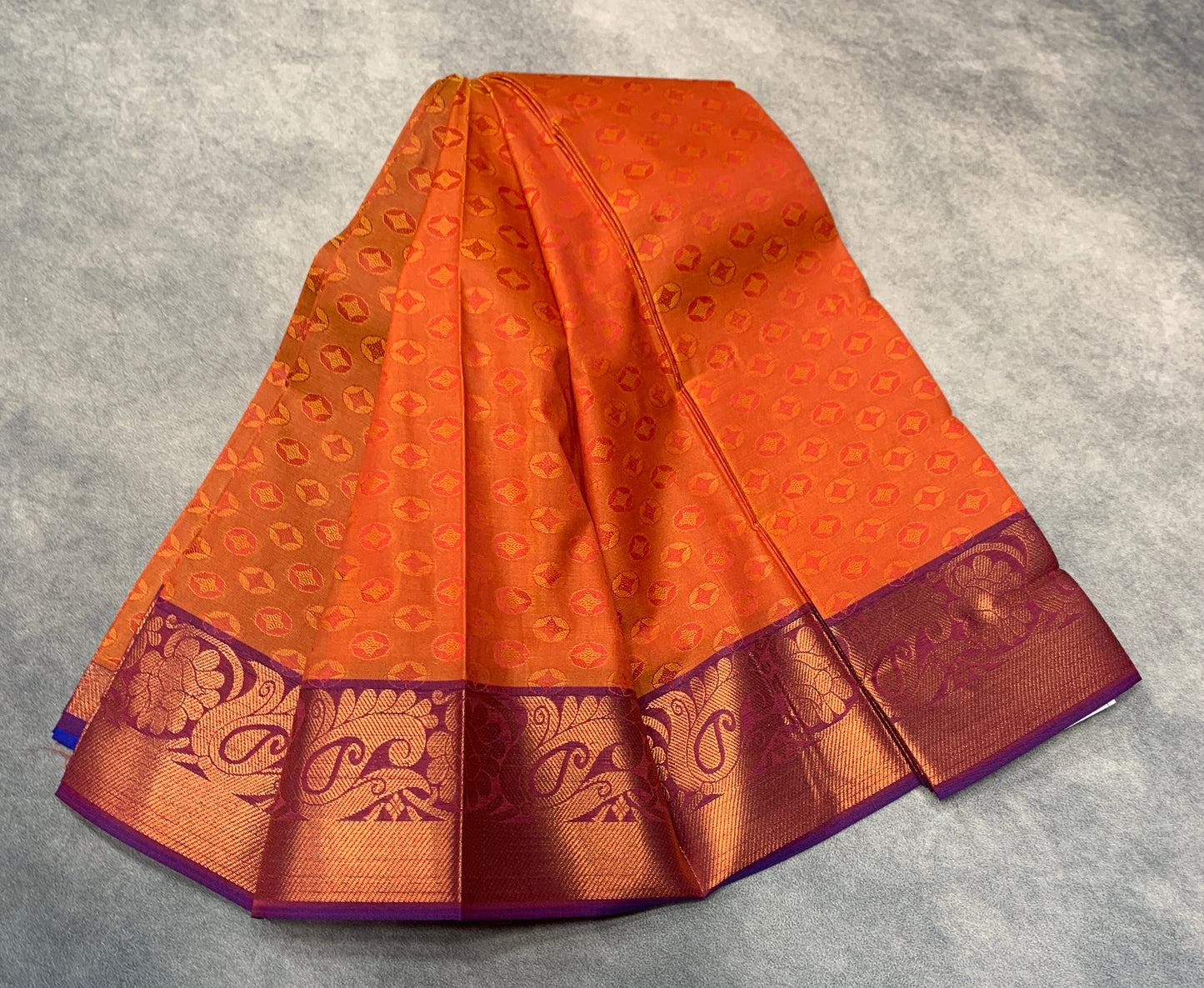 Synthetic Cotton Saree Orange Colour with Copper Floral and Mango Design Border