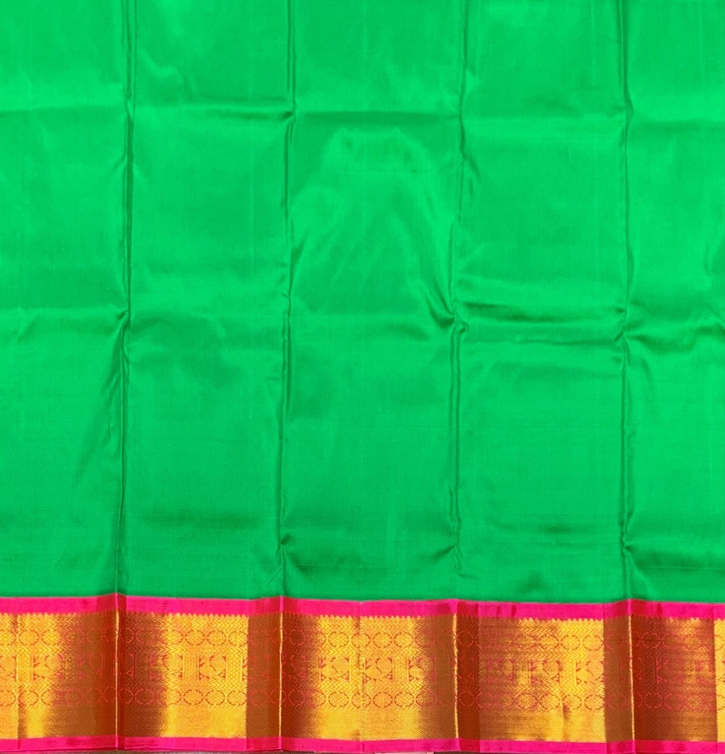 Light Green Shade Pure Kanchipuram Kids Pattu Pavadai with Contrast Border for Newborn to 2 Years