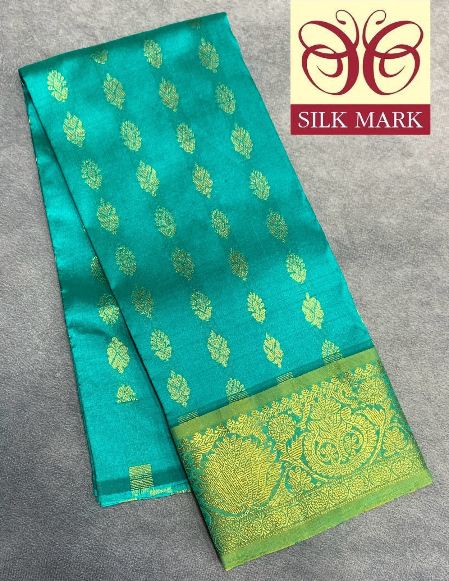 Rama Green Shade Pure Kanchipuram Kids Pattu Pavadai with Contrast Border for Newborn to 2 Years