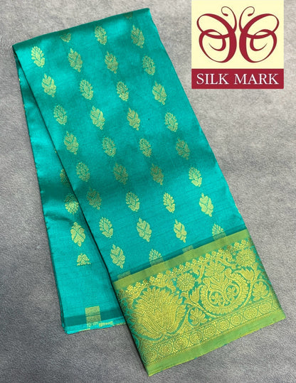 Rama Green Shade Pure Kanchipuram Kids Pattu Pavadai with Contrast Border for Newborn to 2 Years