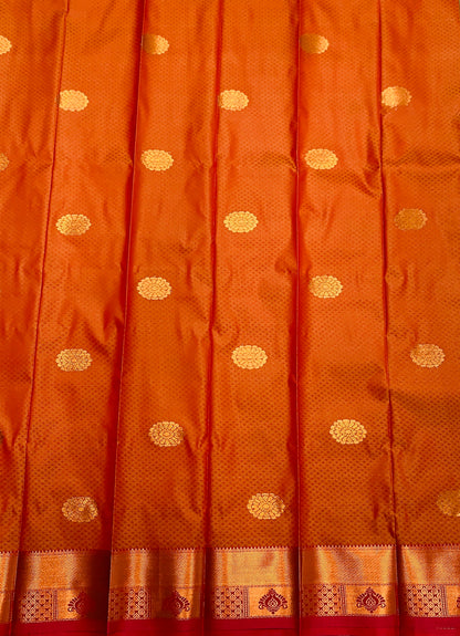 Brownish Orange Shade Silk Cotton Saree with Copper Zari Border and Floral Design