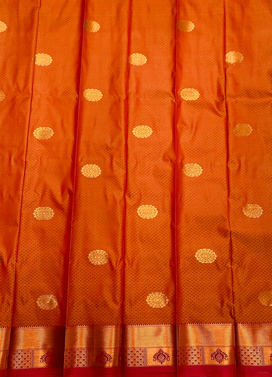 Brownish Orange Shade Silk Cotton Saree with Copper Zari Border and Floral Design