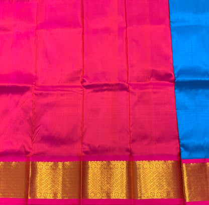 Sky Blue Shade Pure Kanchipuram Kids Pattu Pavadai with Contrast Border for Newborn to 2 Years