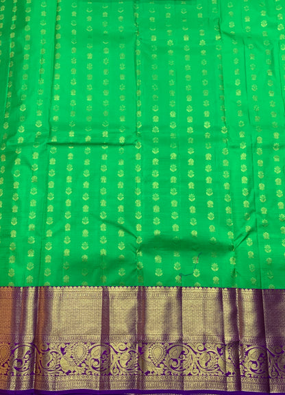 Light Green Shade Pure Kanchipuram Kids Pattu Pavadai with Contrast Border for Age Above 10 Years