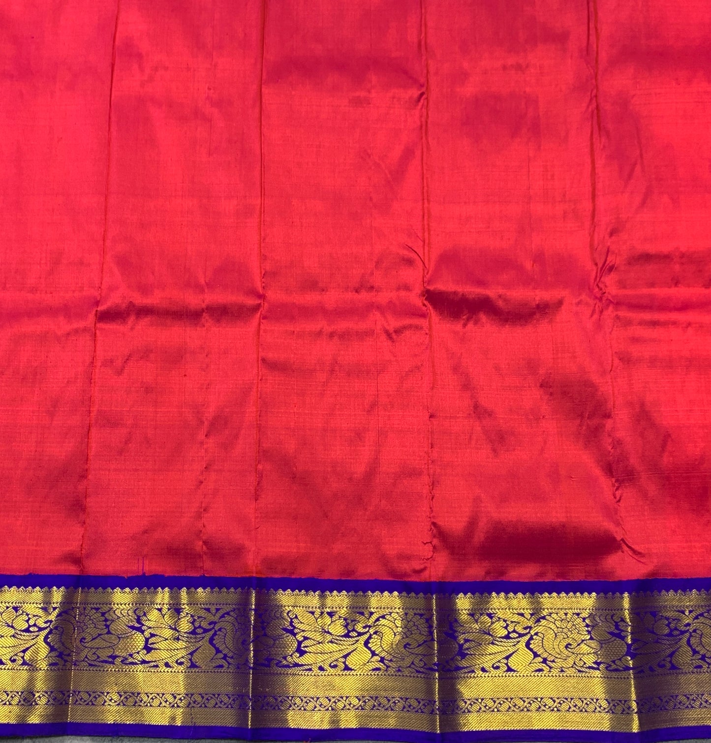 Red shade Pure Kanchipuram Kids Pattu Pavadai with Contrast Border for Newborn to 2 Years