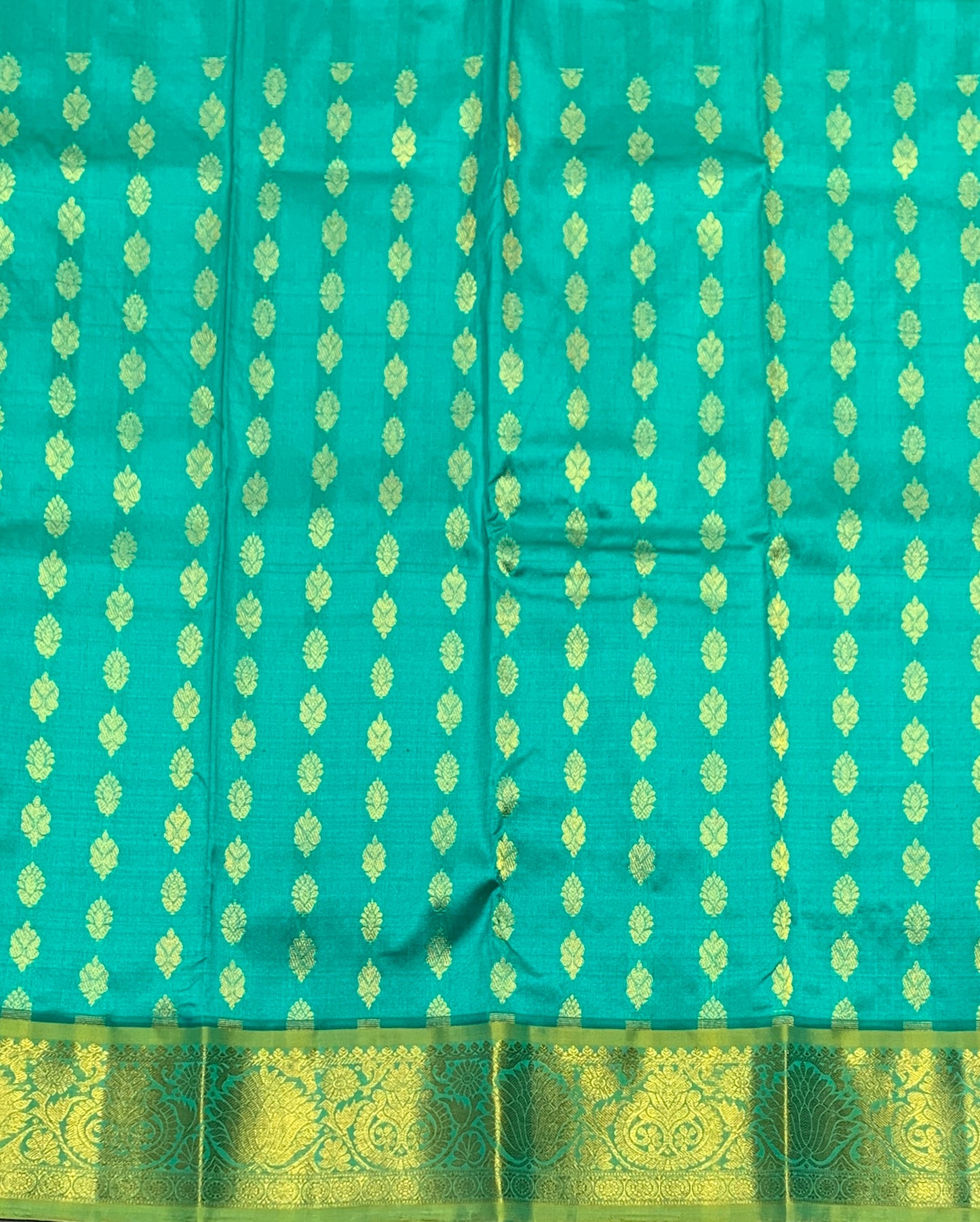 Rama Green Shade Pure Kanchipuram Kids Pattu Pavadai with Contrast Border for Newborn to 2 Years