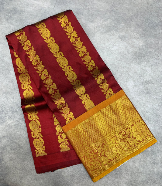 Brown shade Pure Kanchipuram Kids Pattu Pavadai with contrast border for age 5 to 10