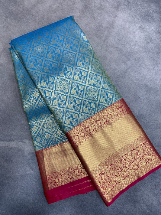Fancy Tissue Saree Rama Blue Colour with Red Colour Border