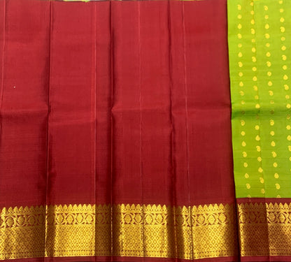 Lime Green Shade Pure Kanchipuram Kids Pattu Pavadai with Contrast Border for Newborn to 2 Years