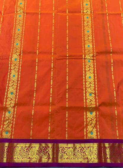 Orange shade Semi Silk Kids Pattu Pavadai with Contrast border for age above 10 years