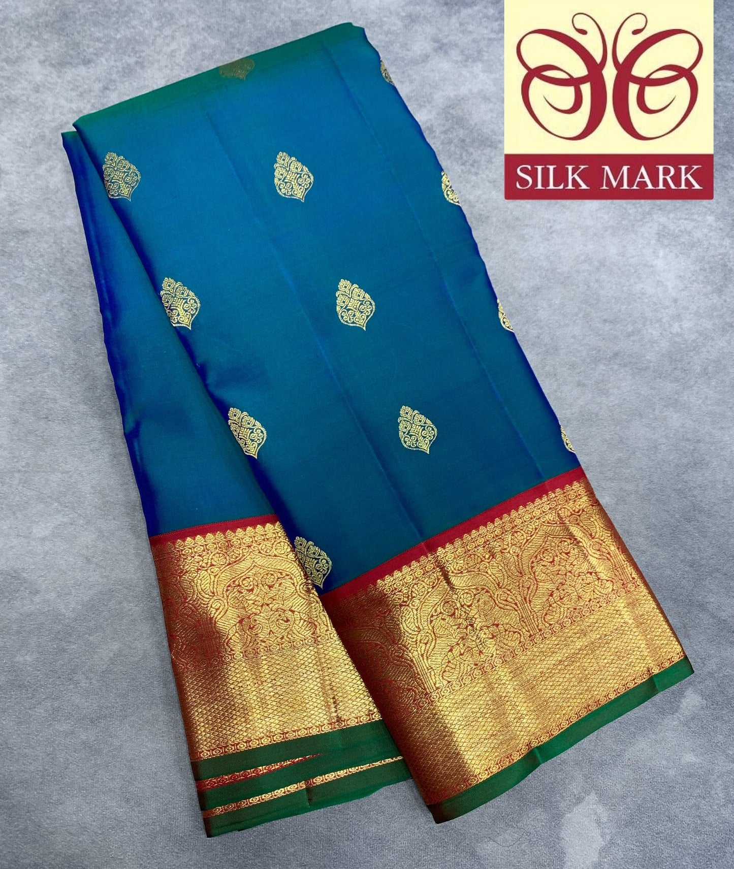 Pure Kanchipuram Silk Peacock Blue Colour with Red and Golden Zari Border