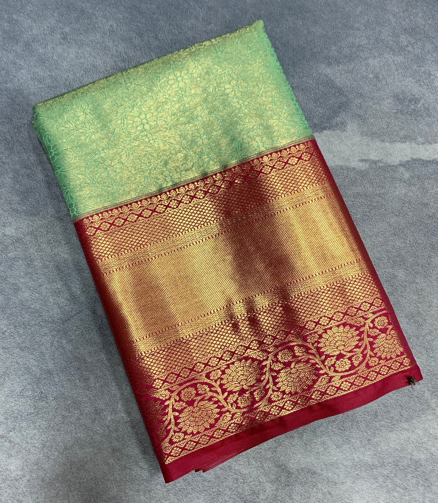 Fancy Tissue Saree Sapphire Colour with Red Colour Floral Design Border