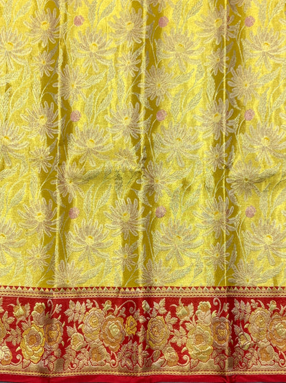 Yellow Shade Pure Kanchipuram Kids Pattu Pavadai with Contrast Border for Newborn to 2 Years