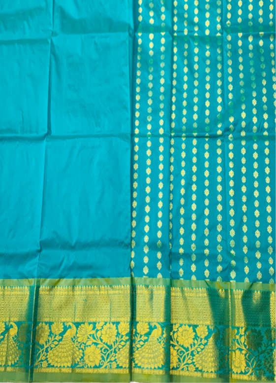 Rama Green shade Semi Silk Kids Pattu Pavadai with contrast border for age above 10 years