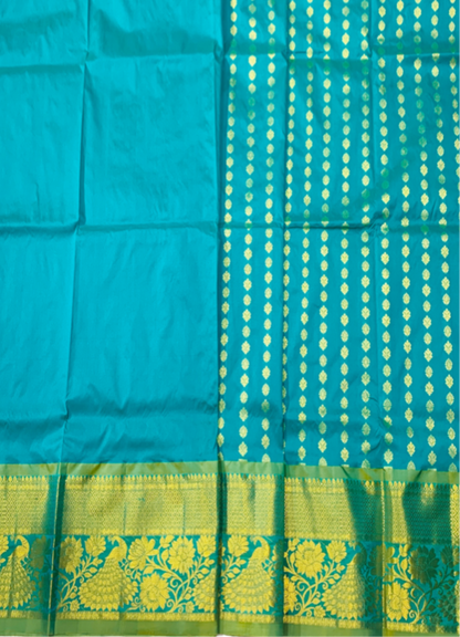 Rama Green shade Semi Silk Kids Pattu Pavadai with contrast border for age above 10 years