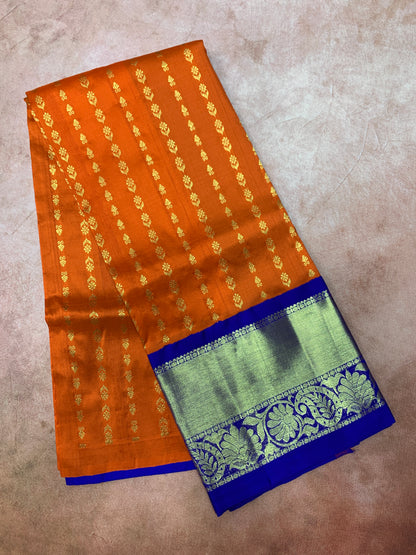 Orange shade Pure Kanchipuram Kids Pattu Pavadai with Contrast Border for age 5 to 10
