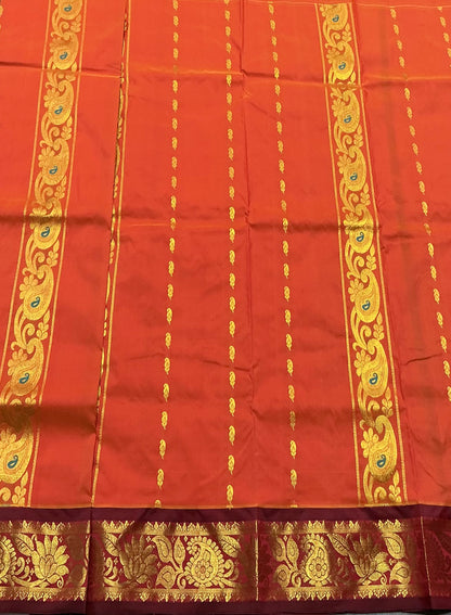 Orange Shade Semi silk Kids Pattu Pavadai with Contrast border for age 5 to 10