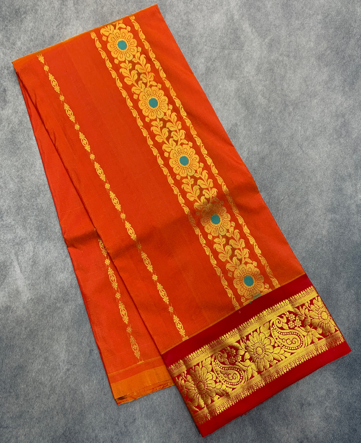 Orange shade Semi Silk Kids Pattu Pavadai with Contrast border for age above 10 years