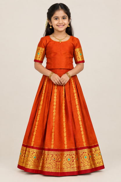 Orange shade Semi Silk Kids Pattu Pavadai with Contrast border for age above 10 years