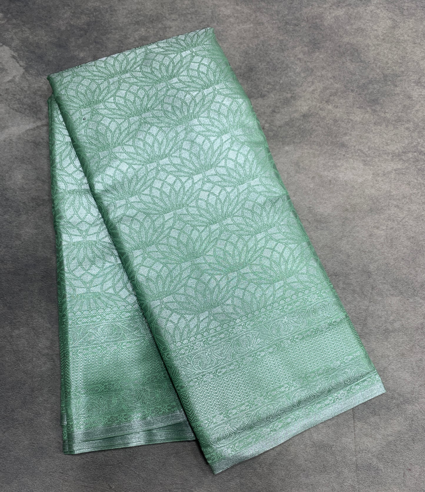 Fancy Tissue Saree Pista Green Colour with Self Design Border