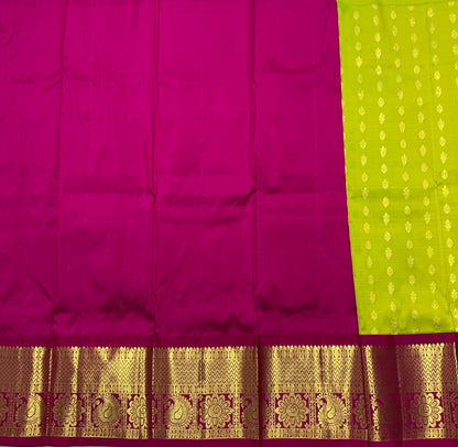 Parrot Green Colour Pure Kanchipuram Kids Pattu Pavadai with Contrast border for age 2 to 5