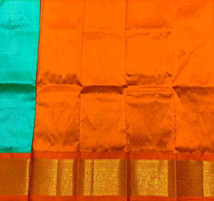 Sapphire shade Pure Kanchipuram Kids Pattu Pavadai with Contrast Border for Newborn to 2 Years