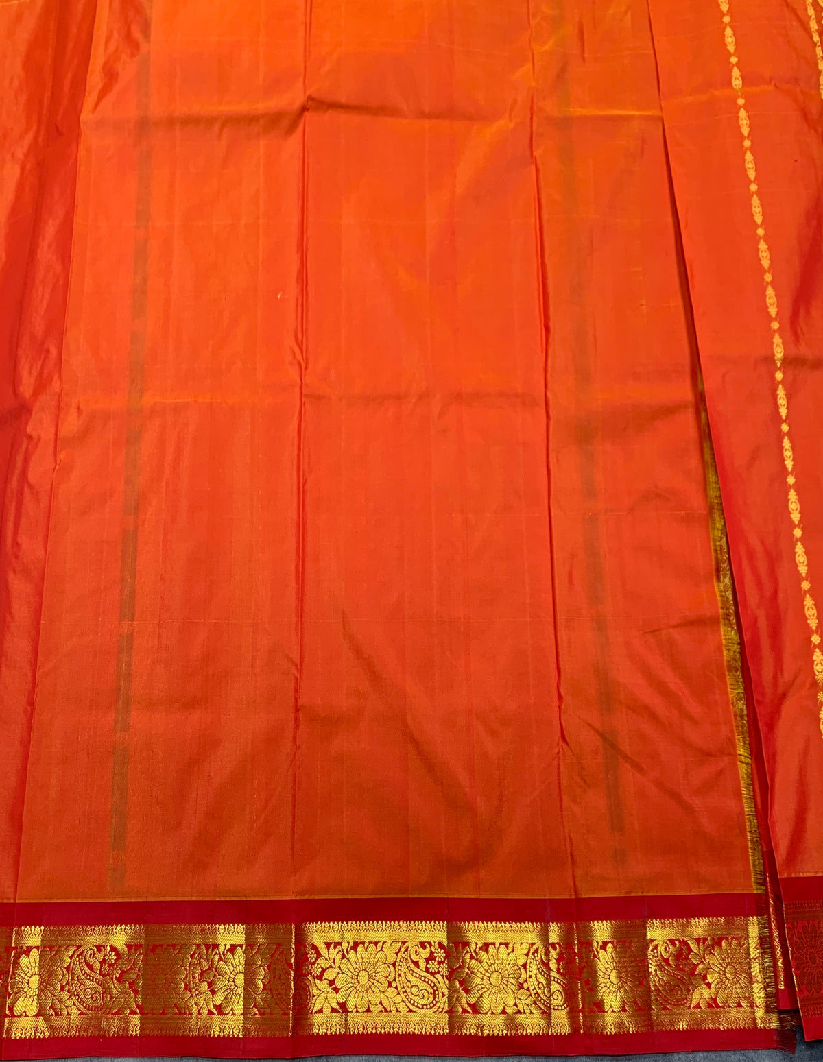 Orange shade Semi Silk Kids Pattu Pavadai with Contrast border for age above 10 years