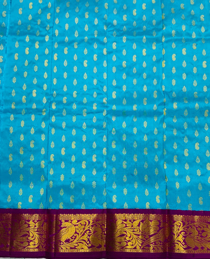 Sky Blue shade Pure kanchipuram Kids Pattu Pavadai with contrast border for newborn to 2 Years