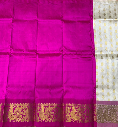 White shade Pure kanchipuram Kids Pattu Pavadai with contrast border for newborn to 2 Years