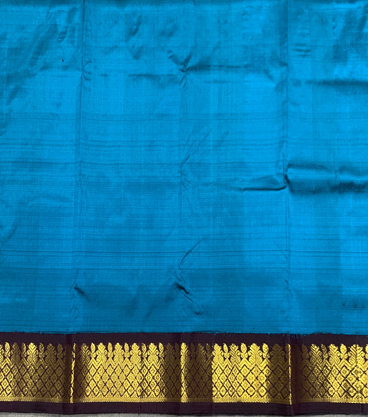 Sky Blue Shade Pure Kanchipuram Kids Pattu Pavadai with Contrast Border for Newborn to 2 Years