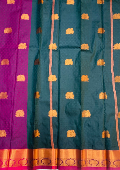 Magenta Shade Silk Cotton Saree with Copper Zari Border and Floral Design