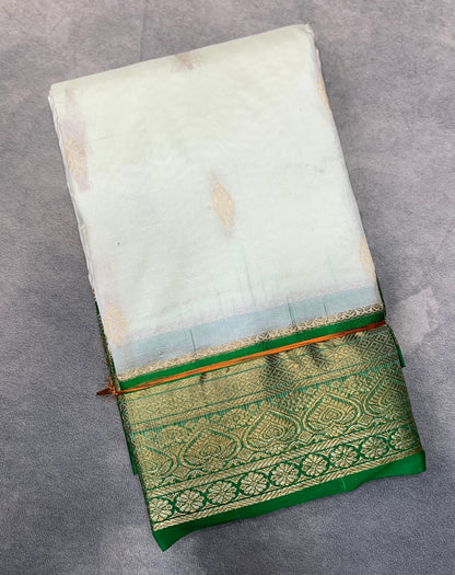 Pure Kanchipuram Silk White Colour with Green Border