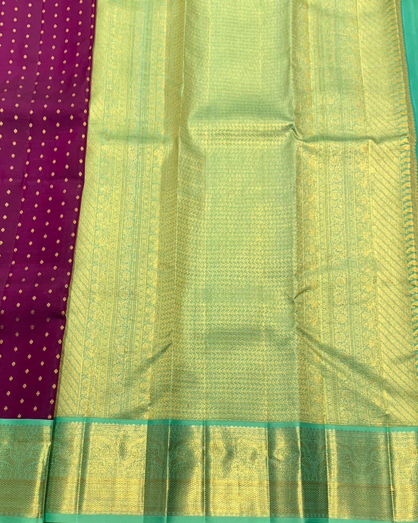 Pure Kanchipuram Silk Magenta Colour with Sapphire and Golden Zari Border