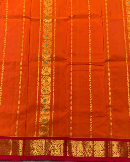 Orange Shade Semi silk Kids Pattu Pavadai with Contrast border for age 5 to 10