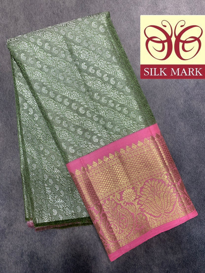 Pista Green Shade Pure Kanchipuram Kids Pattu Pavadai with Contrast Border for Newborn to 2 Years