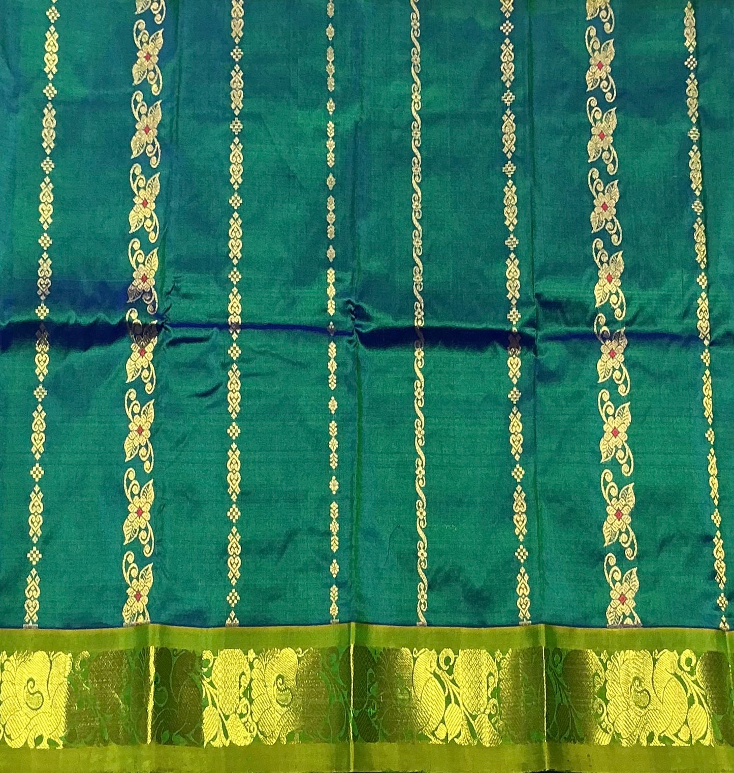 Green Shade Pure Kanchipuram Kids Pattu Pavadai with Contrast Border for Newborn to 2 Years
