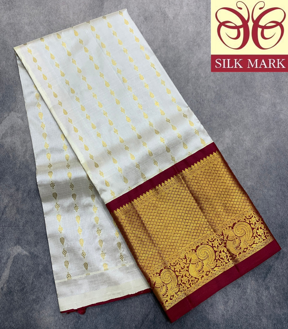 Ivory Shade Pure Kanchipuram Kids Pattu Pavadai with Contrast Border for age 5 to 10