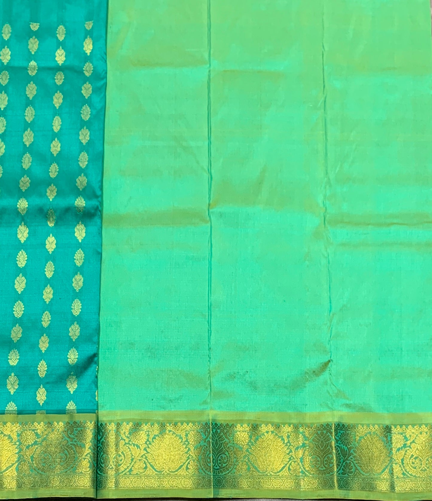 Rama Green Shade Pure Kanchipuram Kids Pattu Pavadai with Contrast Border for Newborn to 2 Years