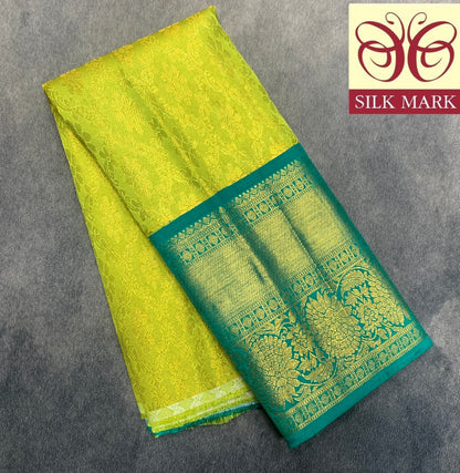 Lime Yellow Shade Pure Kanchipuram Kids Pattu Pavadai with Contrast Border for Newborn to 2 Years