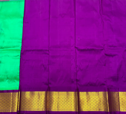 Light Green Shade Pure Kanchipuram Kids Pattu Pavadai with Contrast Border for Newborn to 2 Years