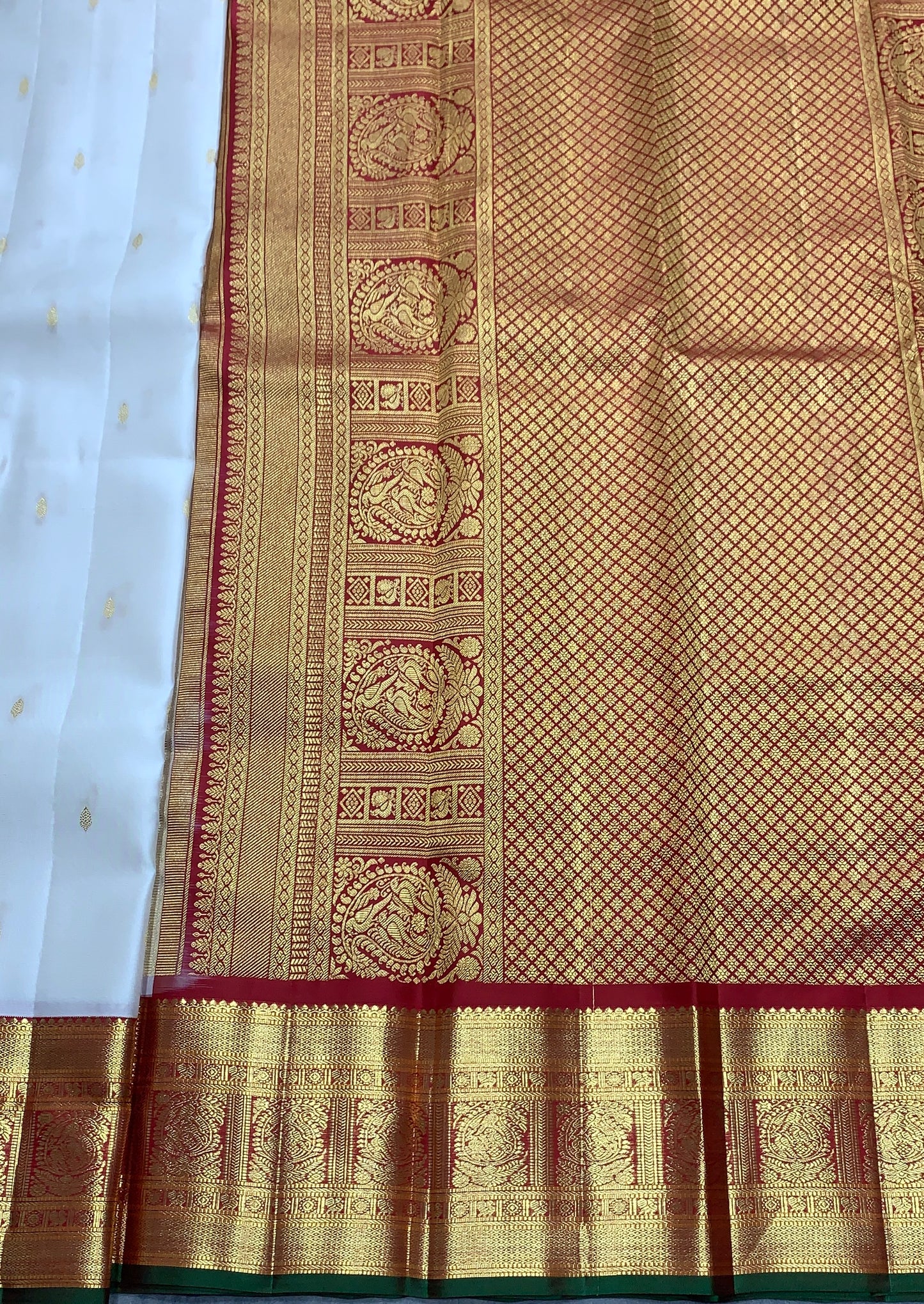 Pure Kanchipuram Silk Off White Colour with Red and Golden Zari Border