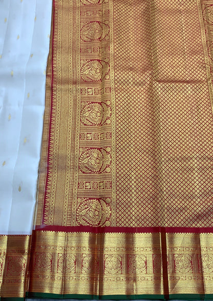 Pure Kanchipuram Silk Off White Colour with Red and Golden Zari Border