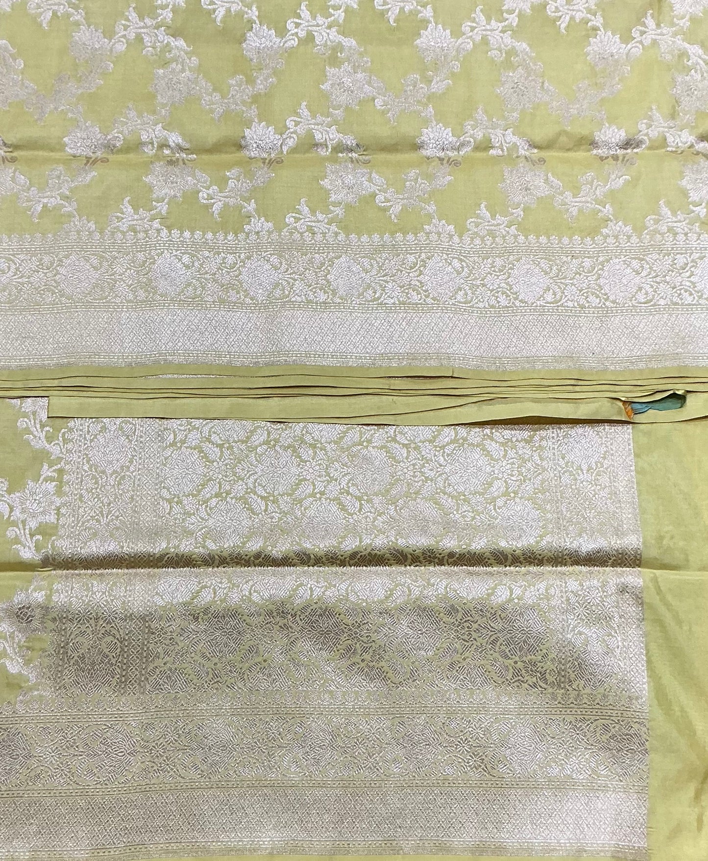 Pure Banaras Silk Saree Light Yellow Colour with Beautifully Crafted Floral Banarasi border