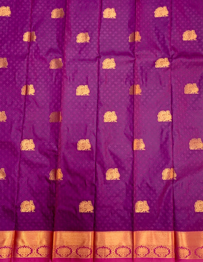 Magenta Shade Silk Cotton Saree with Copper Zari Border and Floral Design