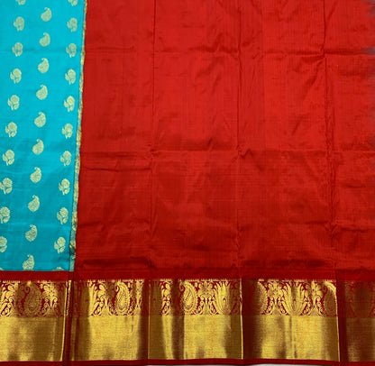 Sky Blue Colour Pure Kanchipuram Kids Pattu Pavadai with Contrast border for age 2 to 5