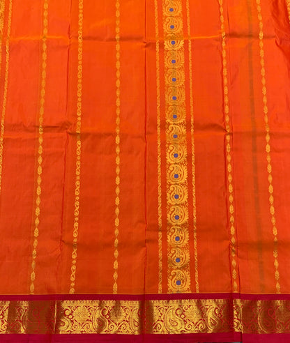 Orange Shade Semi silk Kids Pattu Pavadai with Contrast border for age 5 to 10