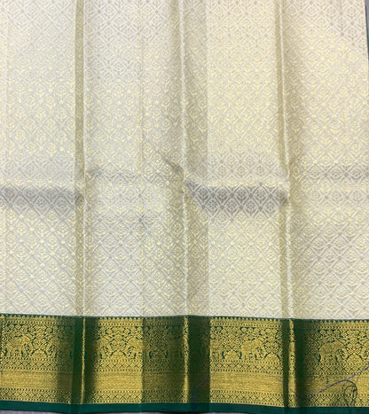 Ivory Shade Pure Kanchipuram Kids Pattu Pavadai with Contrast Border for Newborn to 2 Years